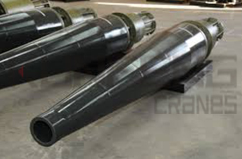 Bend zone stiffeners that provide shock and wear protection for submarine power cable outlet pipe