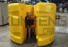 Polyurethane bending restrictor for submarine cable anti-bending device